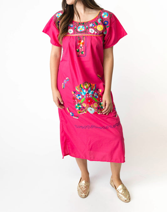 Close-up of the best artisan hand-stitched floral embroidery on women's dress